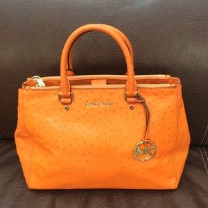 MK orange leather satchel